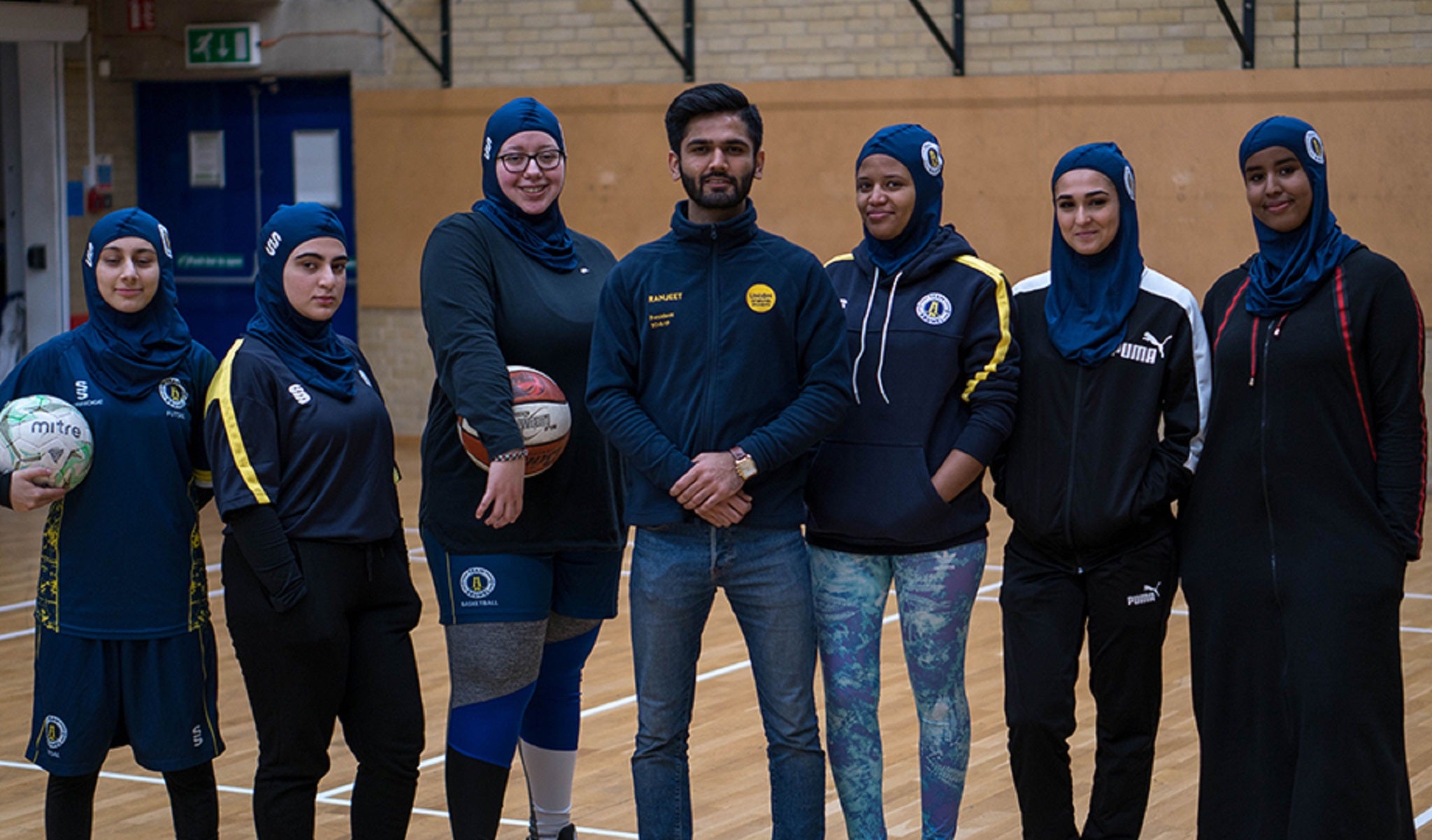 President of the Union of Brunel Students Ranjeet Rathore with hijabi members of Team Brunel.