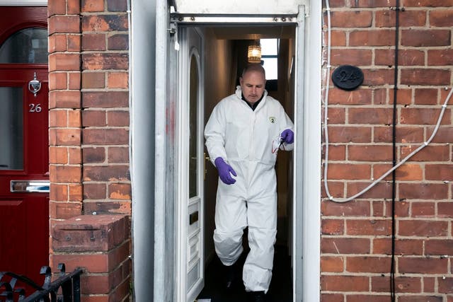 A police officer at a property on Raglan Street in Hull, after 24-year-old Pawel Relowicz was remanded in custody after appearing in court charged with unrelated offences on 11 February