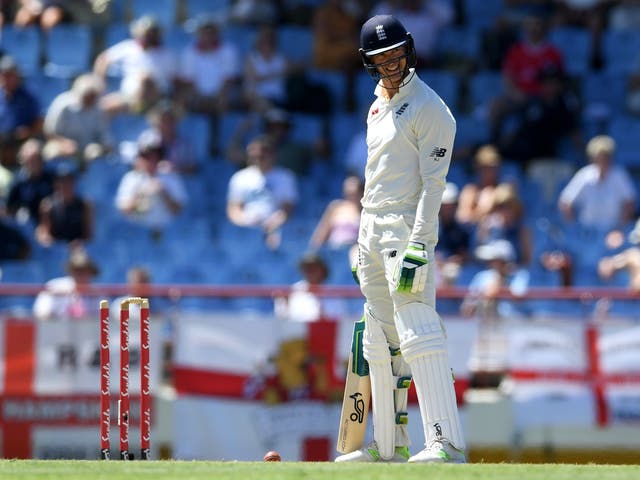 Keaton Jennings reacts after dragging on to his own stumps