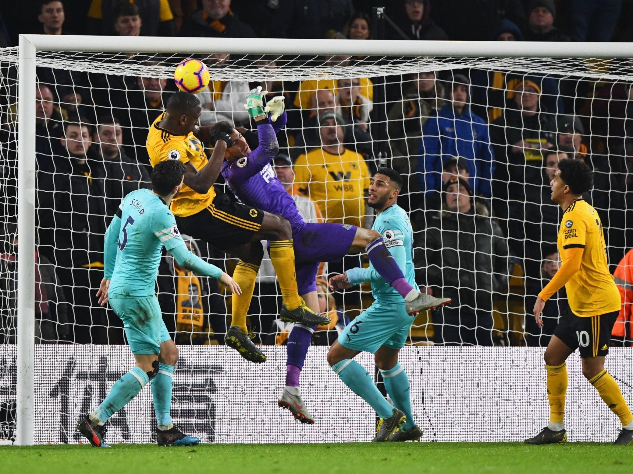 Martin Dubravka loses his battle with Willy Boly at the death