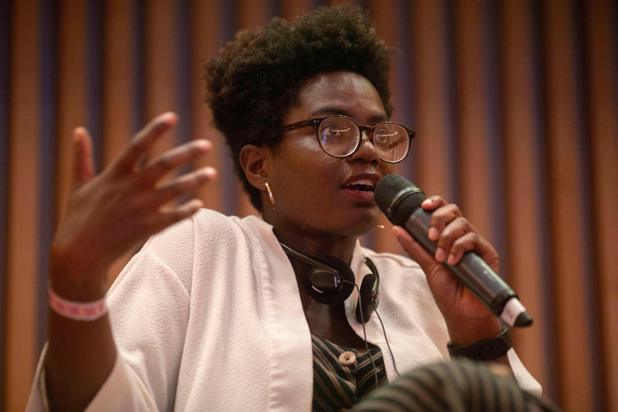 Reni Eddo-Lodge speaks during a panel at the WOW Festival 2018