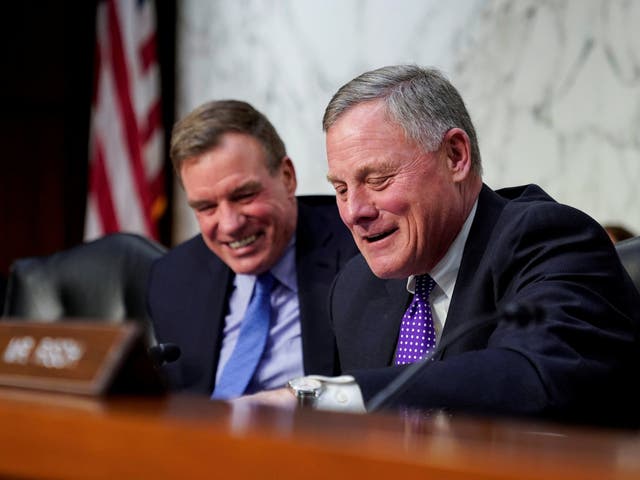 Chairman of the Senate Intelligence Committee Richard Burr and ranking member Mark Warner prepare for a hearing on Capitol Hill in Washington.