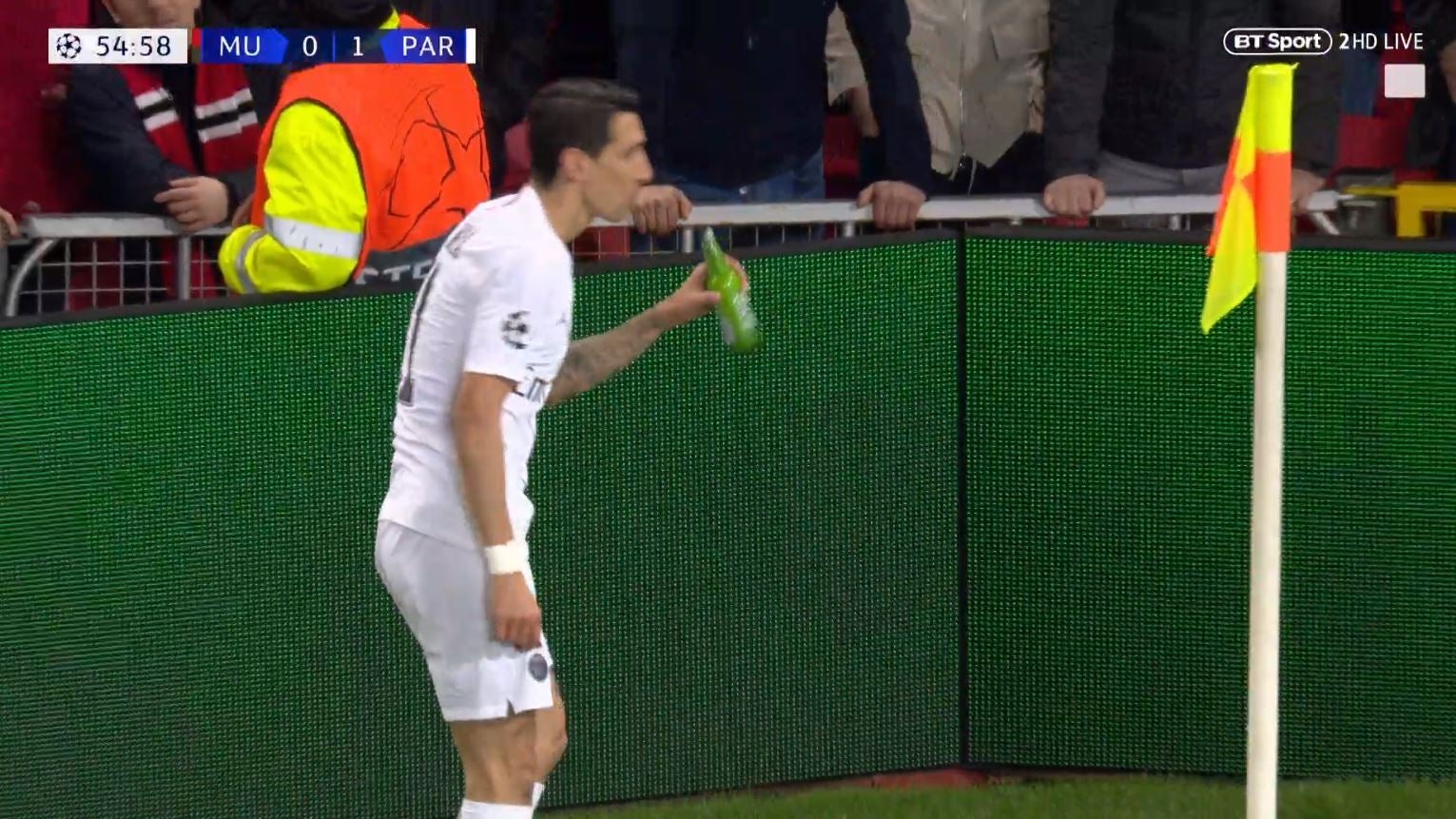 Di Maria went as if to drink from the bottle before handing it to an official
