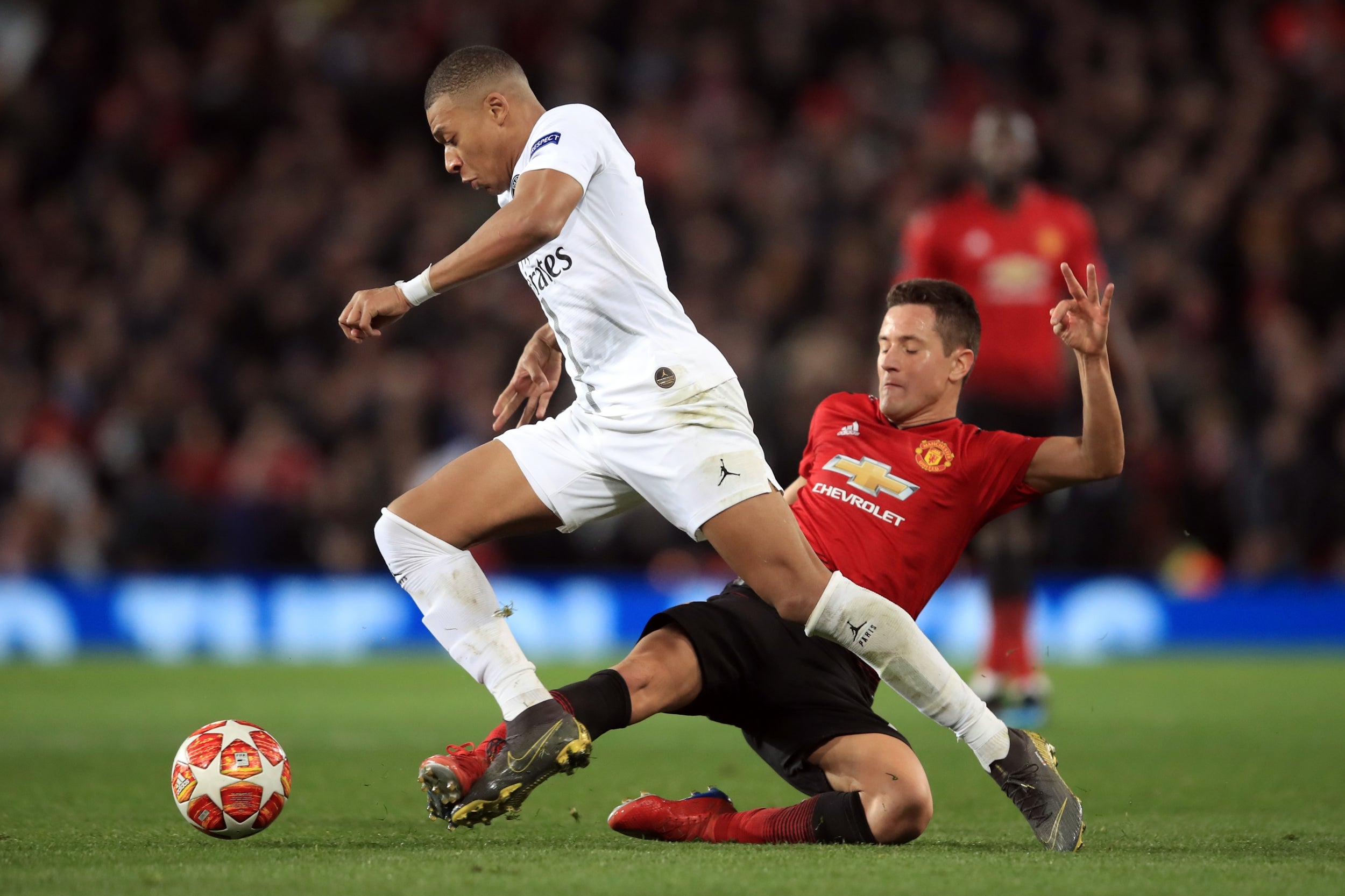 Ander Herrera tackles Kylian Mbappe (Getty)