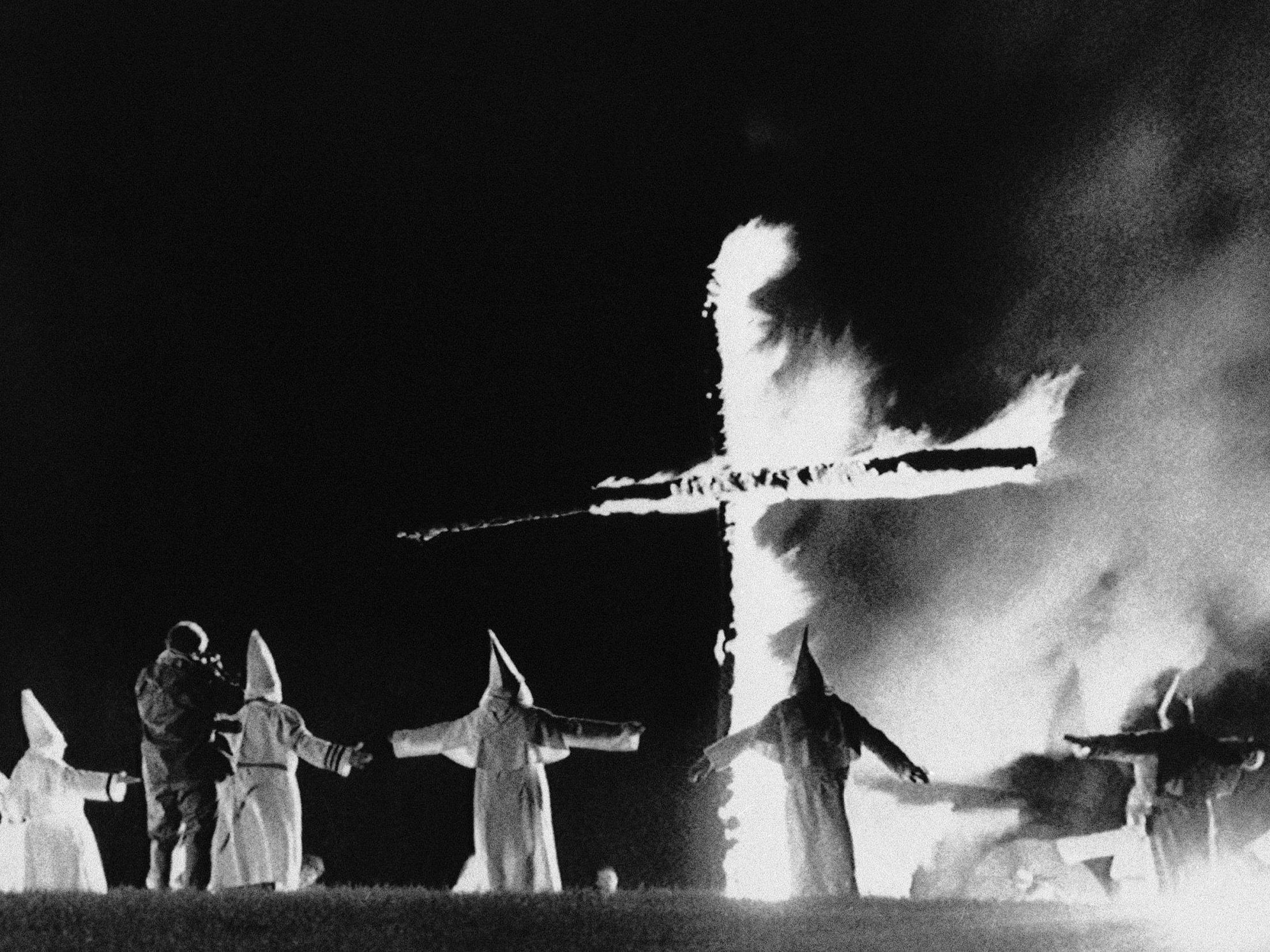 Cross-burning is historically associated with the white supremacist Ku Klux Klan (File photo)