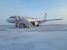 Aircraft stairs collapse injuring six passengers at Siberian airport