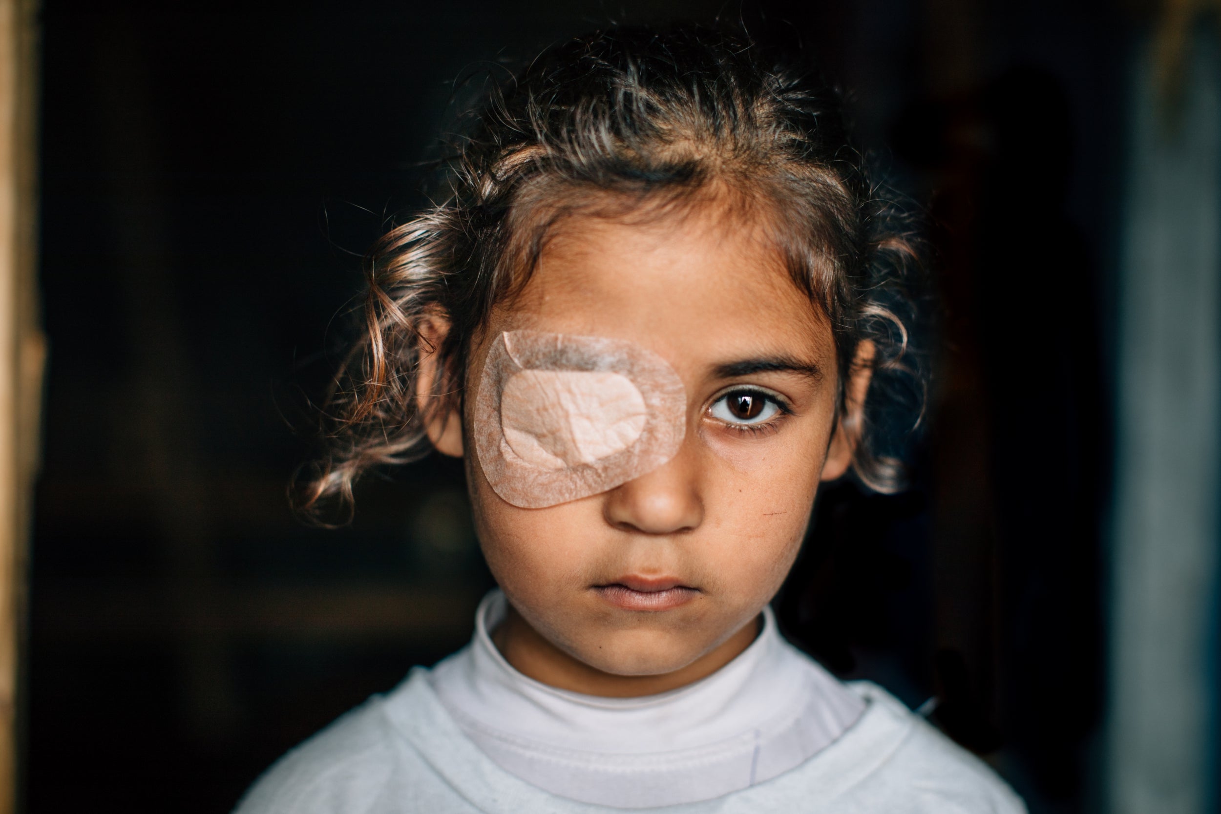 Qaram, 8, is in desperate need of an operation to save her sight