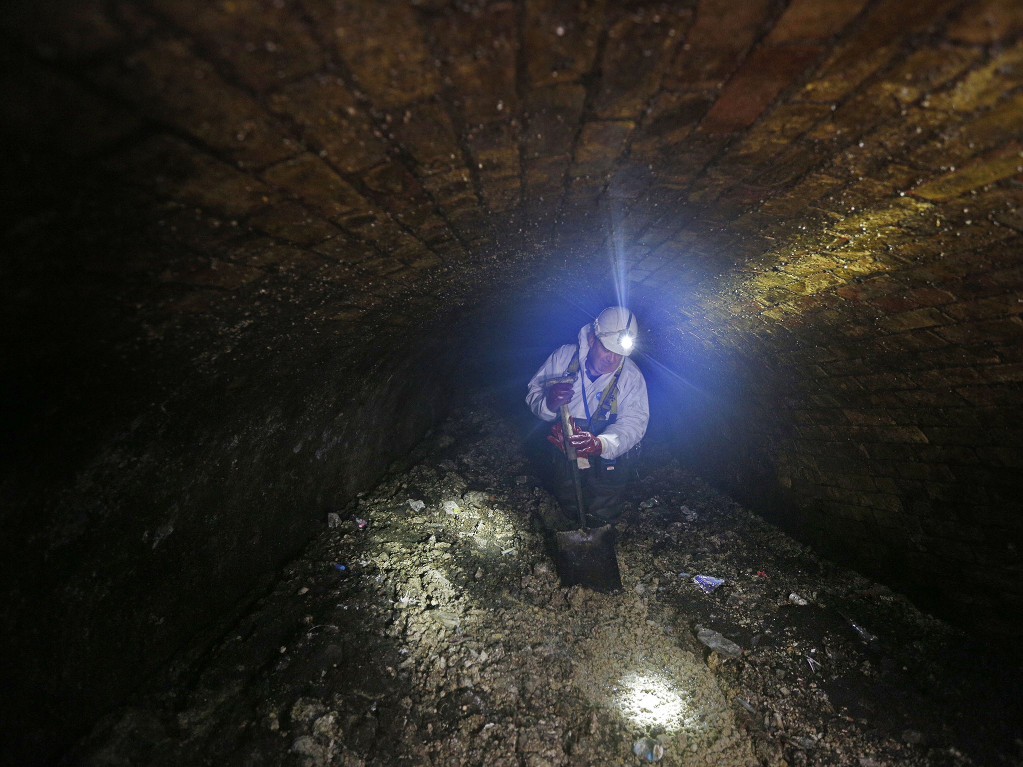 Sewer cleaners have to fight against fatbergs every day in London sewers (AFP/Getty)