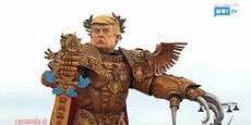 Trump has been reimagined a gigantic 'God Emperor' at a parade in Italy