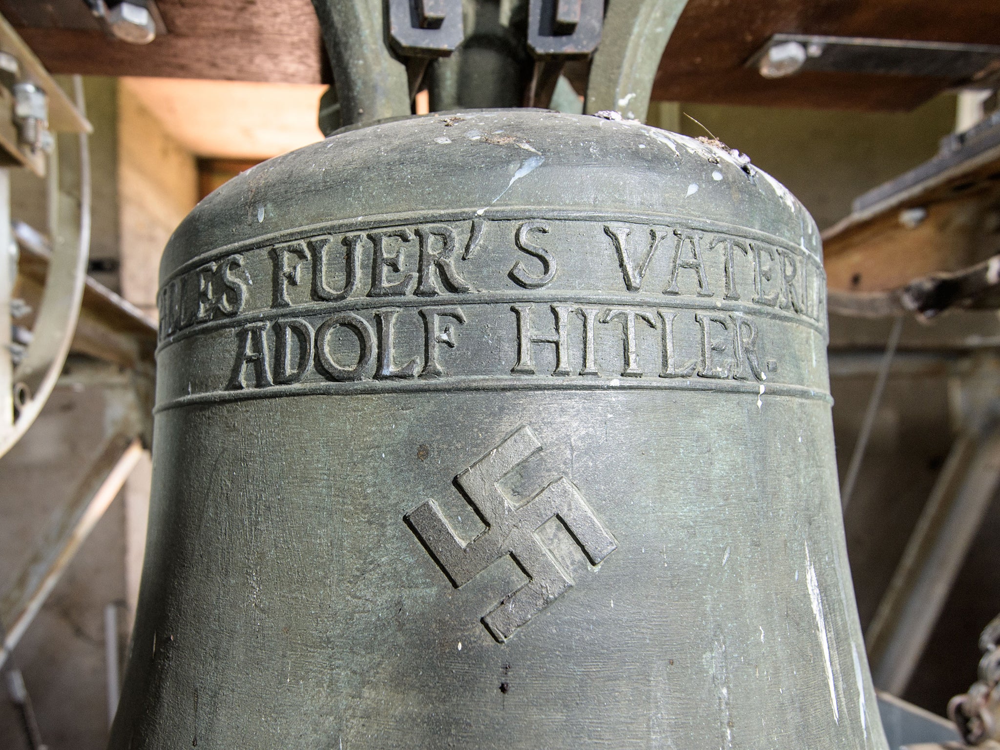 The church bell in Herxheim am Berg is embossed with a swastika and the text: 'Everything for the Fatherland - Adolf Hitler'