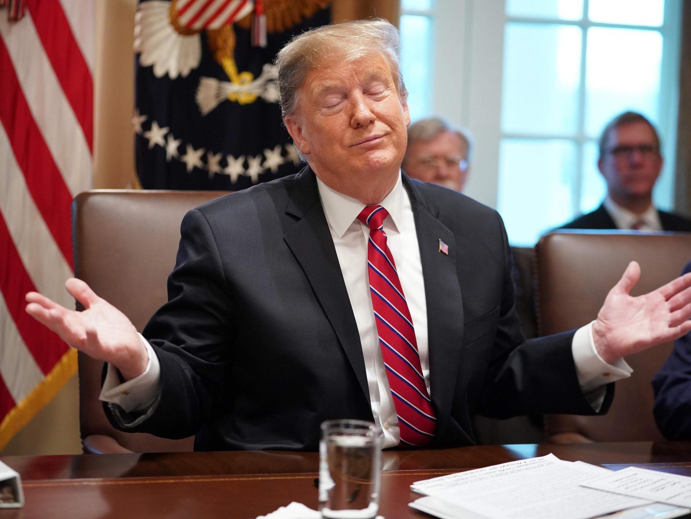 Donald Trump speaks during a cabinet meeting in the White House in Washington, DC
