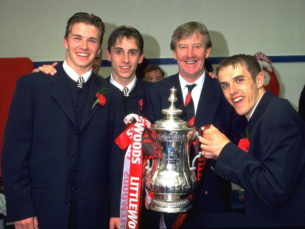 David Beckham, Gary Neville and Phil Neville pictured alongside Manchester United youth coach Eric Harrison