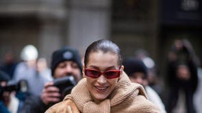 Bella Hadid ditches catwalk to become a hairstylist backstage at