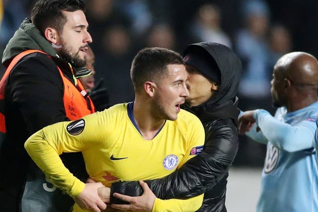 Eden Hazard is approached by a pitch invader