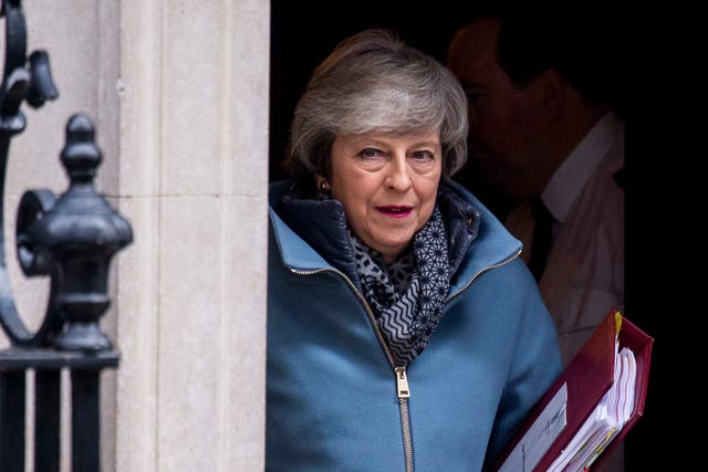 Theresa May said she was 'saddened' by three MPs leaving the Conservative Party