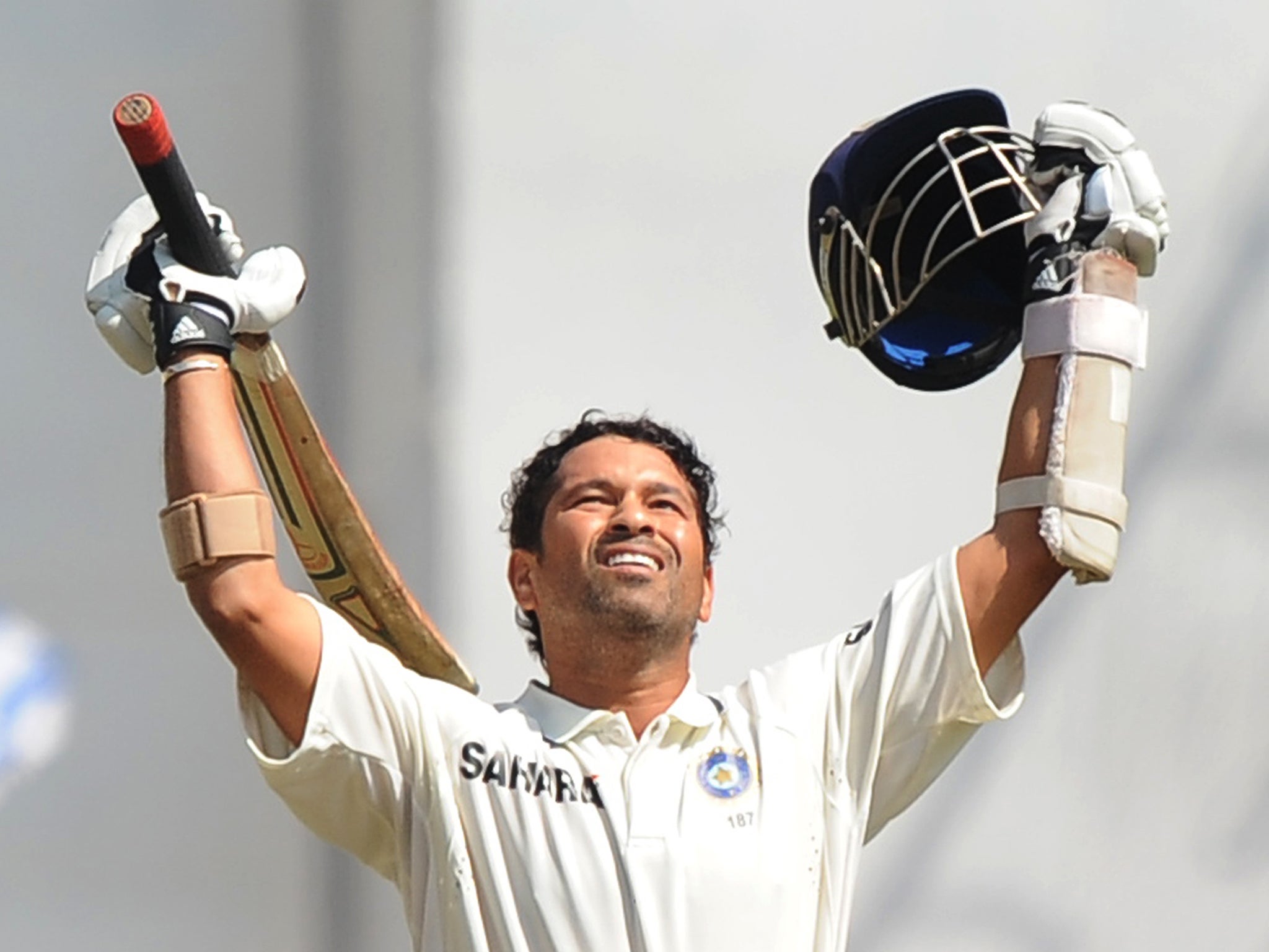 Indian cricketer Sachin Tendulkar celebrates after scoring a double century. He scored his first double century on 24 February 2010