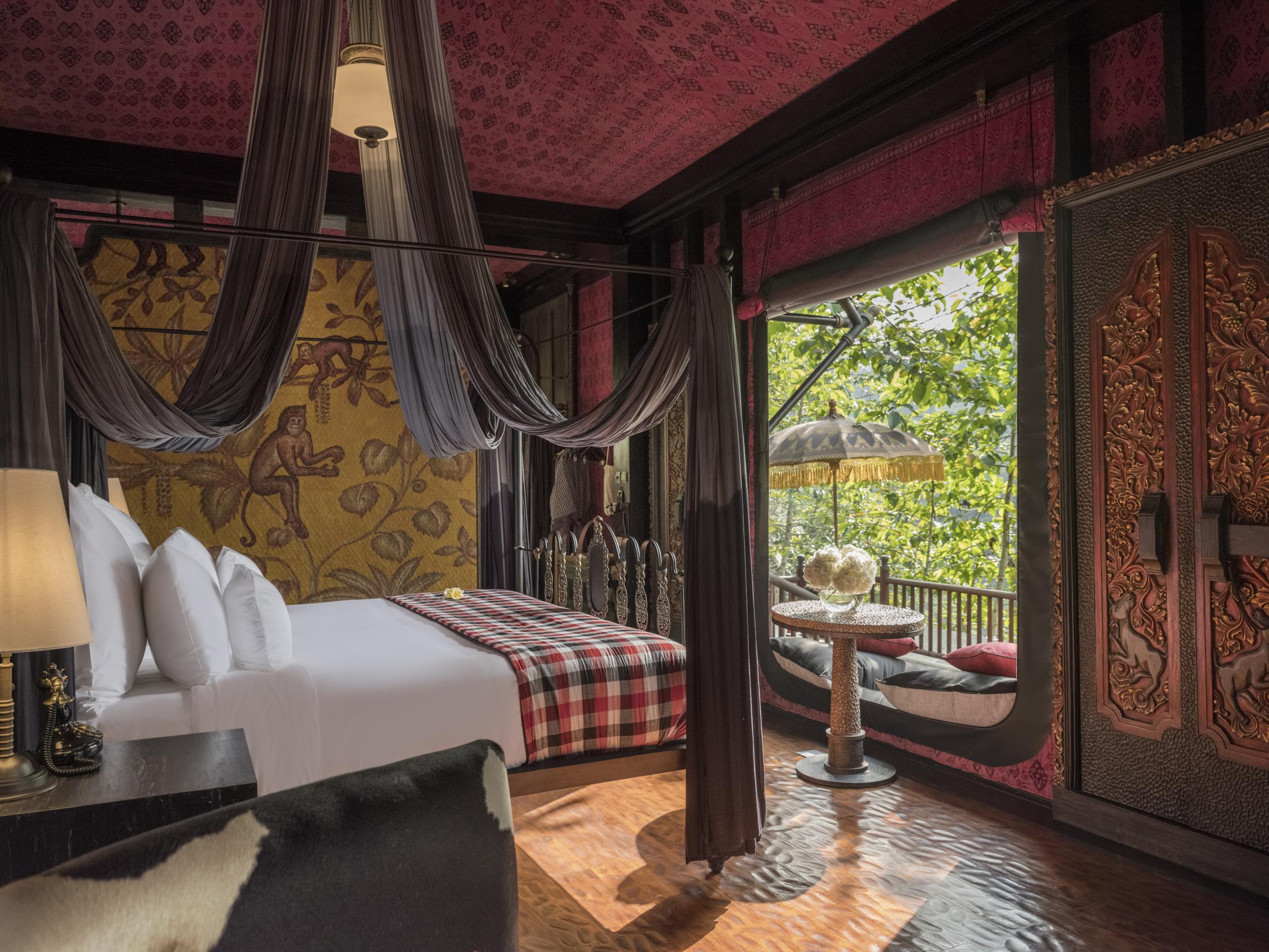 The Keliki Valley bedroom, which offers unobstructed views of the surrounding rainforest and valley