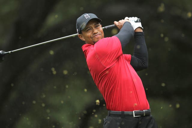 Tiger Woods in his signature red polo shirt during the final round