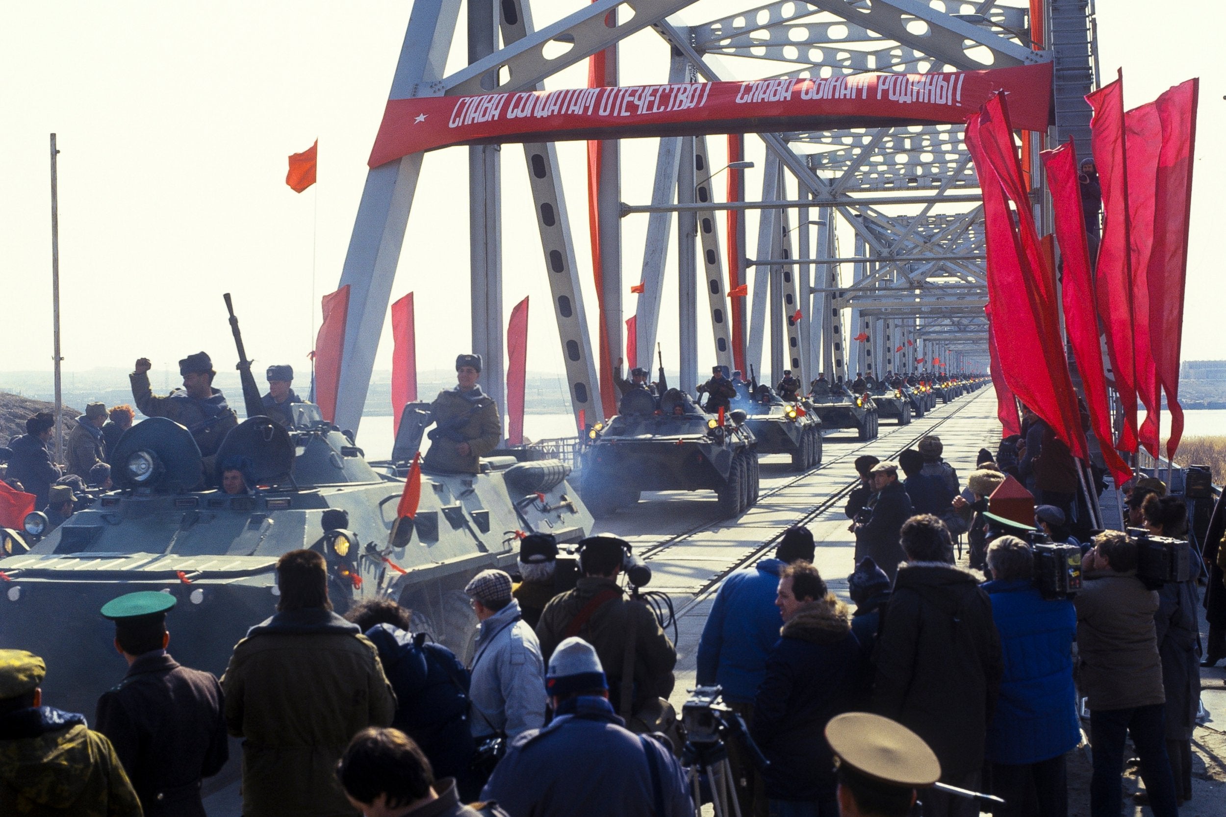 The last Soviet tanks cross a bridge on the border between Afghanistan and then Soviet Uzbekistan as part of the 1989 withdrawal