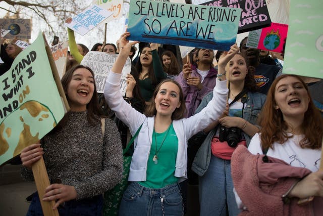 Students at climate change protest in Parliament Square, London