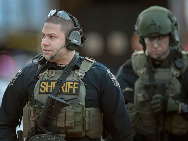 Police secure the area following a shooting at the Henry Pratt Company on 15 February, 2019 in Aurora, Illinois, USA.