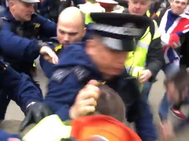 Protesters clash with police at yellow vest march