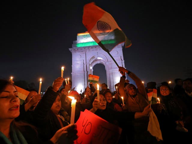 Indians attend vigil to pay tribute to soldiers killed in Kashmir bombing