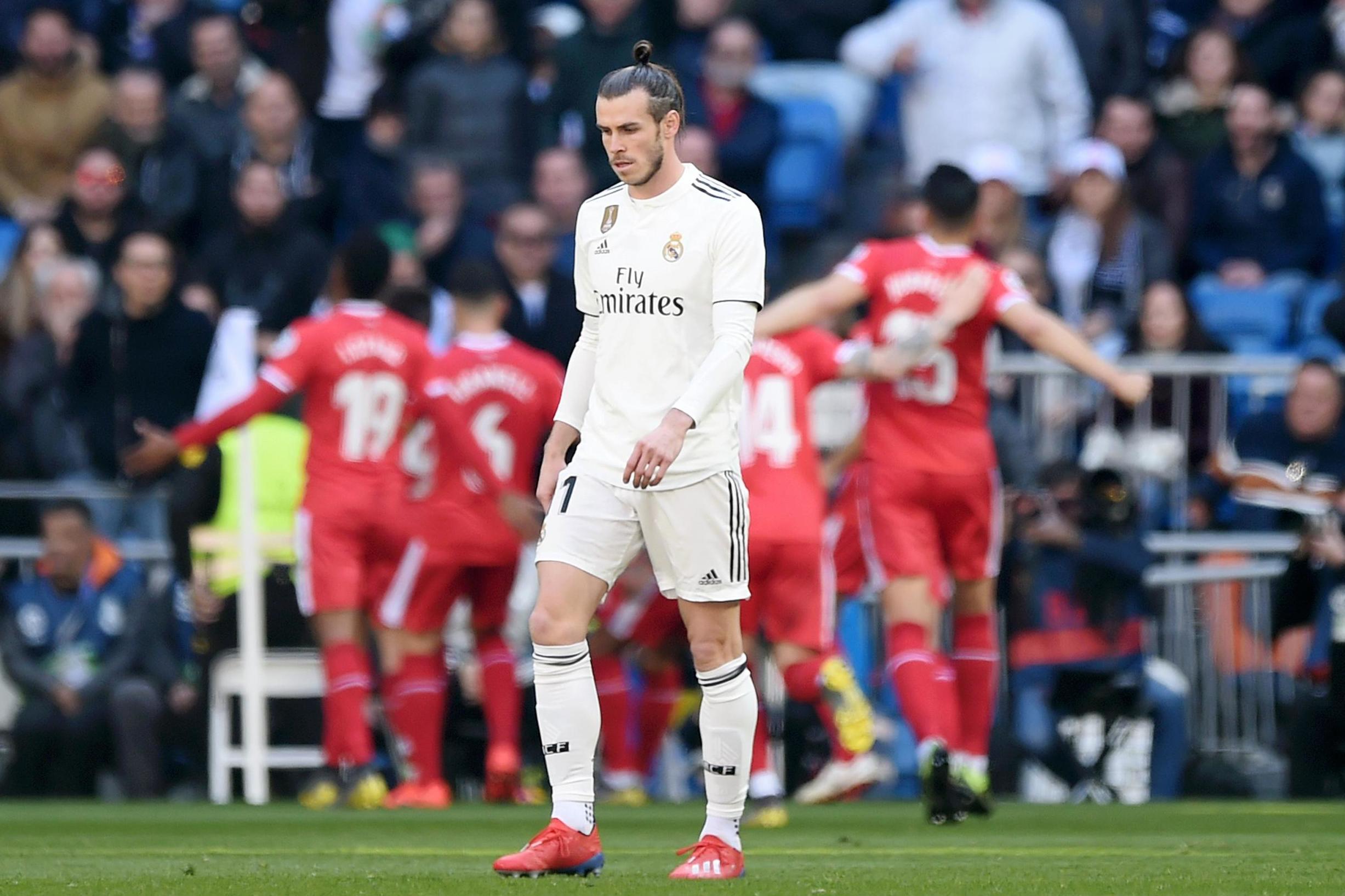 Gareth Bale looks dejected as Girona celebrate (Getty )