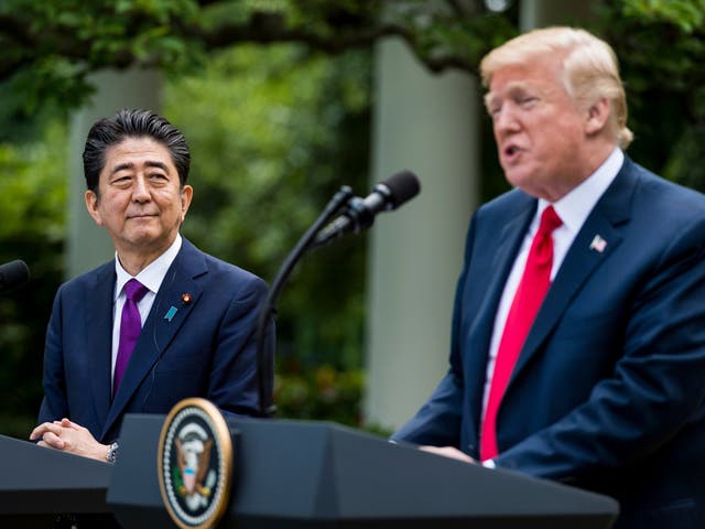 File image of US president Donald Trump (R) and Japanese prime minister Shinzo Abe (L) participating in a joint press conference in June 2018.