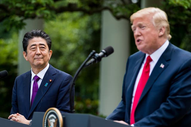 File image of US president Donald Trump (R) and Japanese prime minister Shinzo Abe (L) participating in a joint press conference in June 2018.