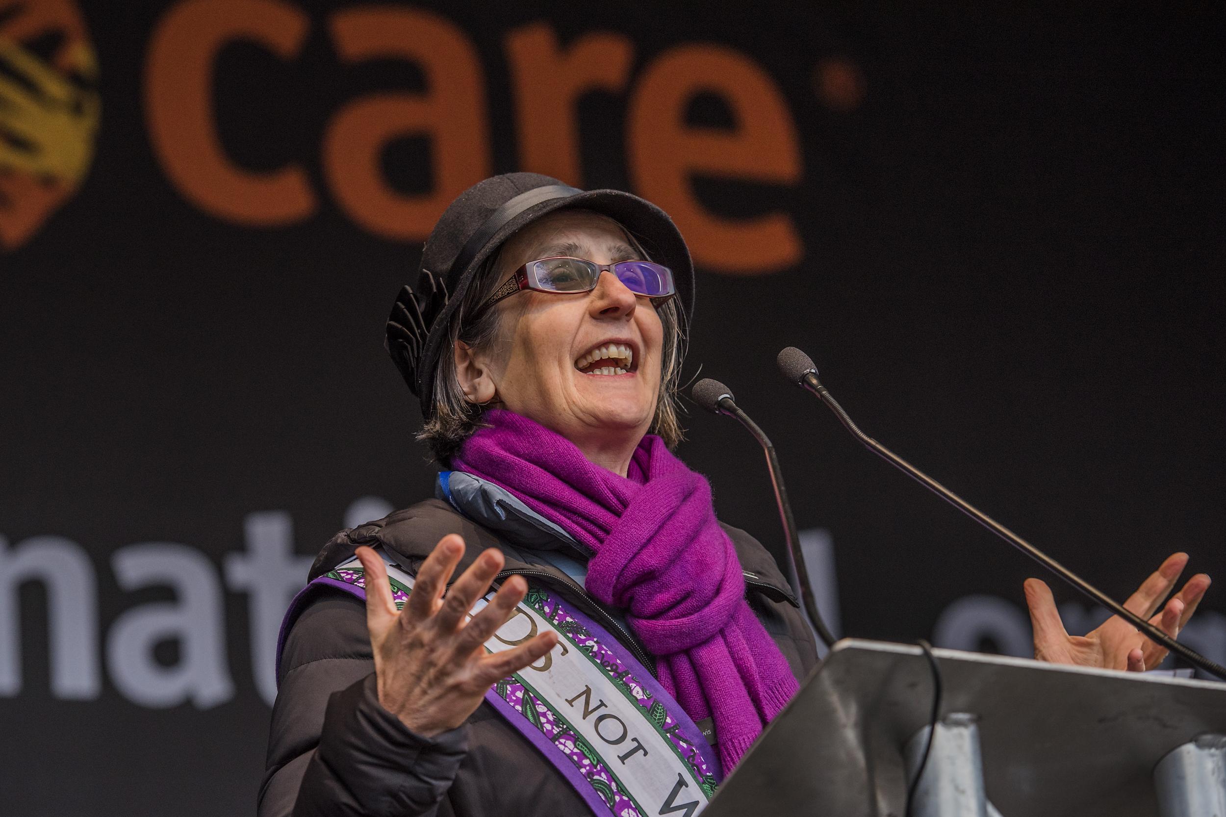 Helen Pankurst speaks – #March4Women 2018, a march and rally in London to celebrate International Women’s Day. (CARE International UK )