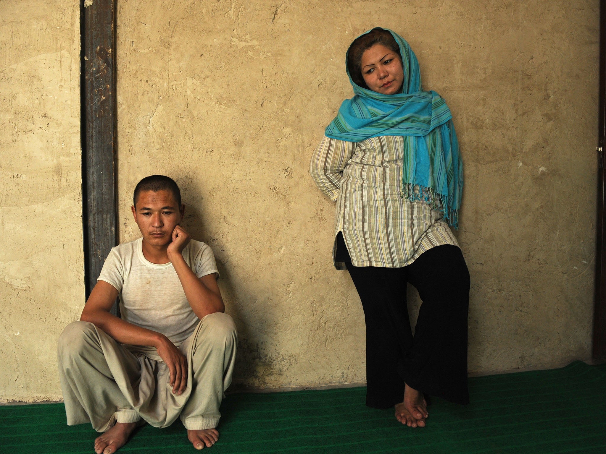 Haidari with an addict at the Mother Camp