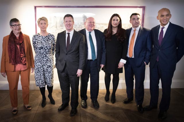 Labour MPs (from left) Ann Coffey, Angela Smith, Chris Leslie, Mike Gapes, Luciana Berger, Gavin Shuker and Chuka Umunna after they announced their resignations in Westminster on Monday