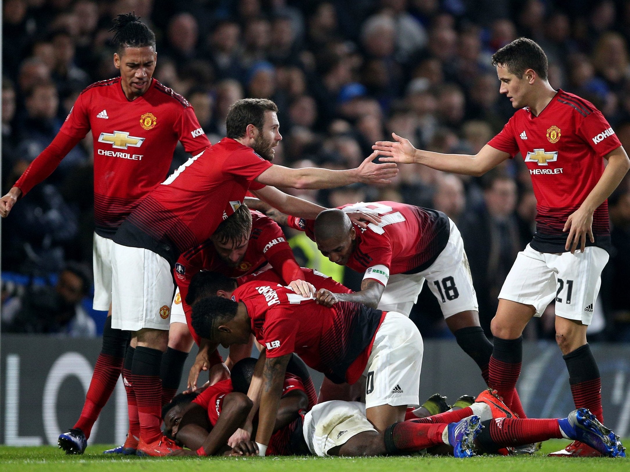 Manchester United celebrate Paul Pogba scoring their second