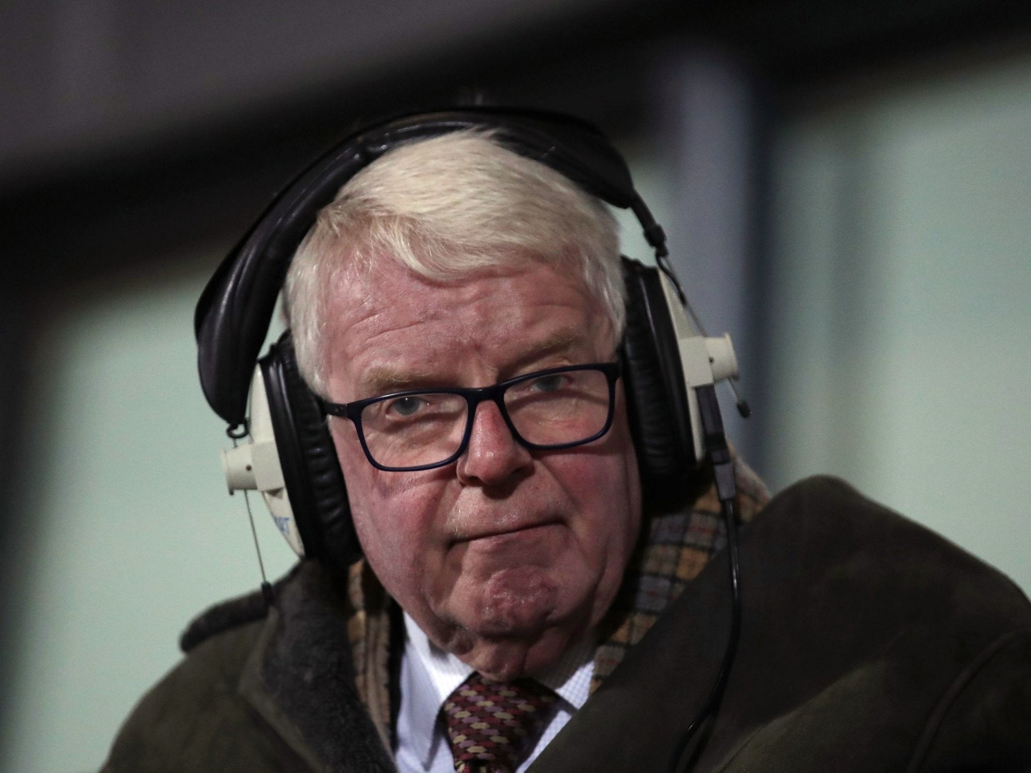 John Motson has apologised to Millwall striker Tom Elliott for making a racist comment