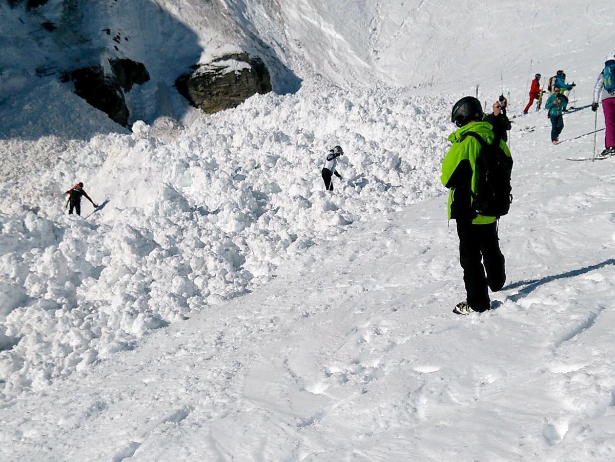 Switzerland avalanche: Rescuers hunt for buried skiers in the Alps after disaster leaves four injured