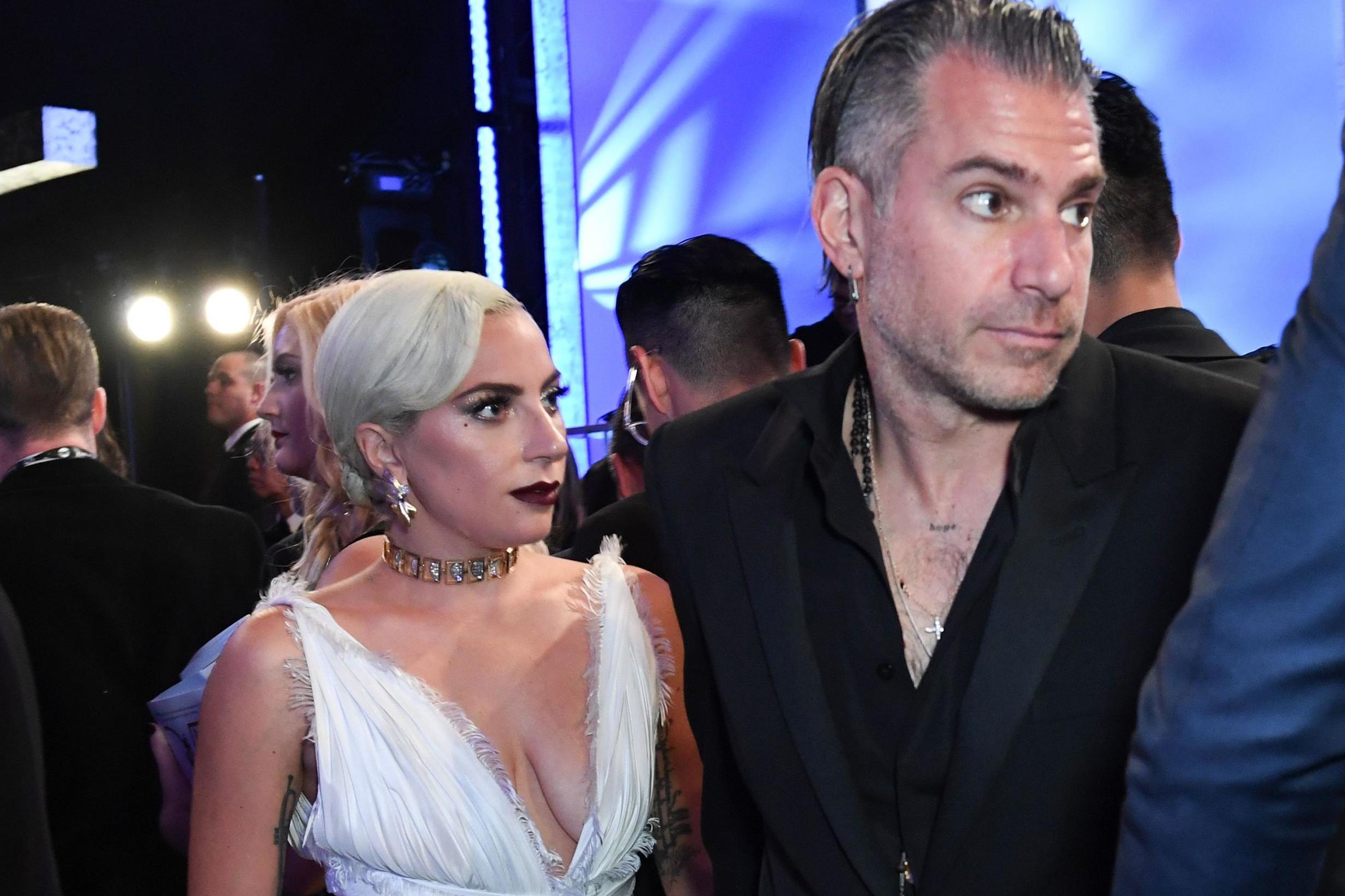 Lady Gaga and Christian Carino attend the 25th Annual Screen Actors Guild Awards show at the Shrine Auditorium in Los Angeles on 27 January, 2019. (Photo credit VALERIE MACON/AFP/Getty Images)