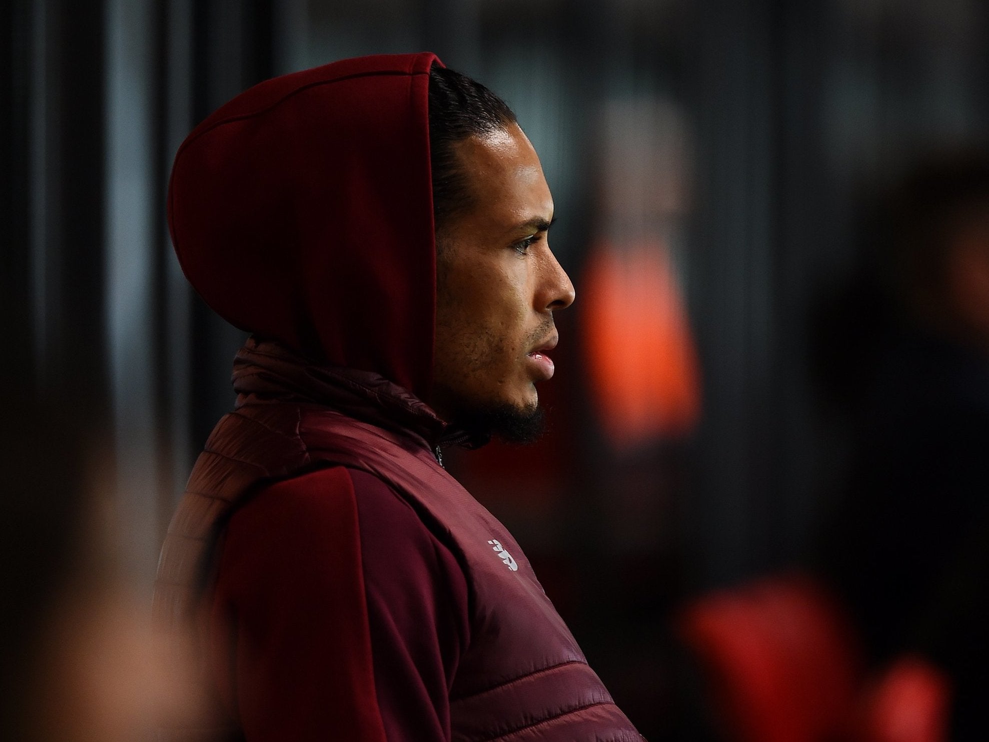 Virgil van Dijk watches on from the stands