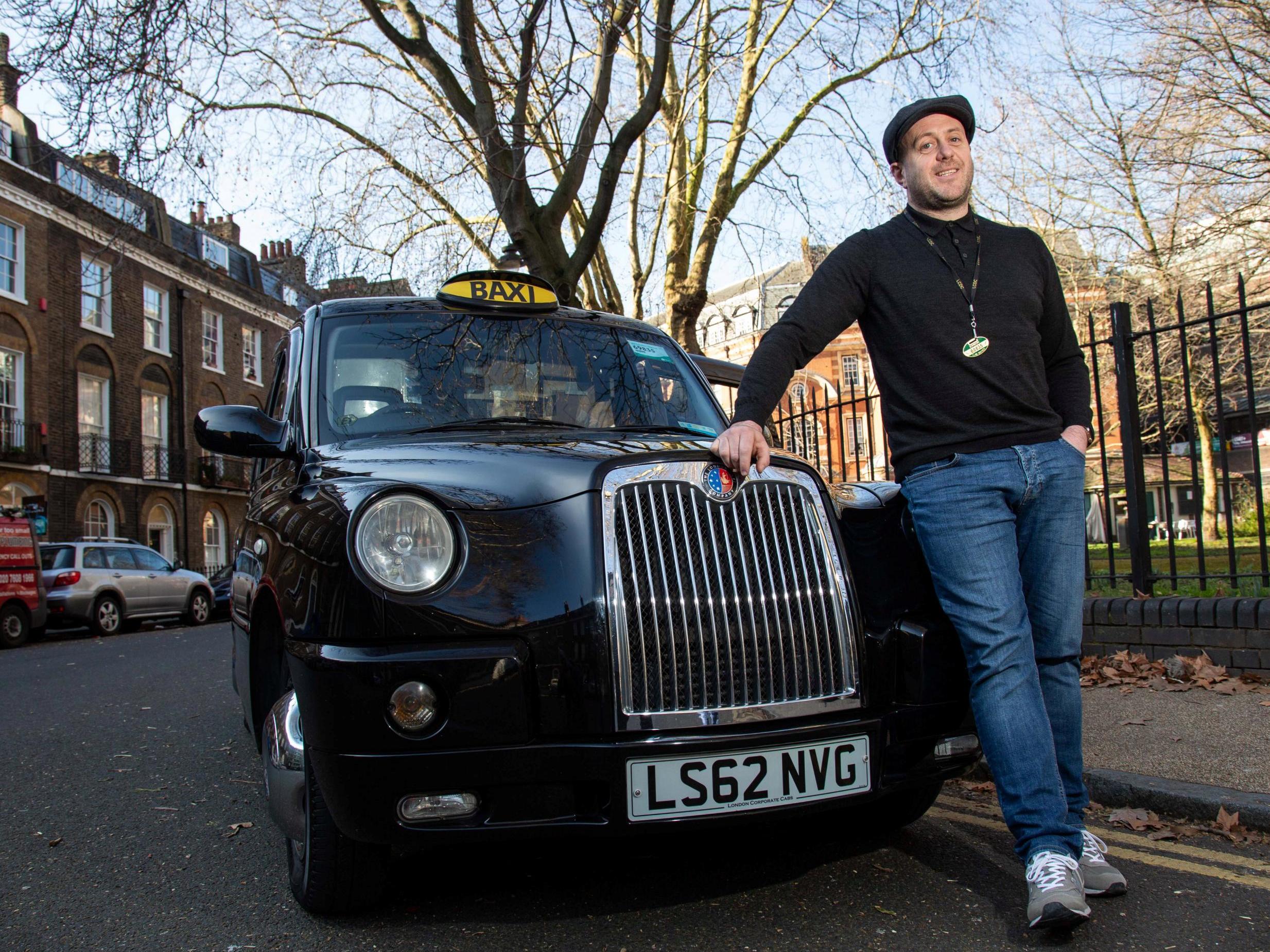 Cab driver Ross with the taxi - SWNS