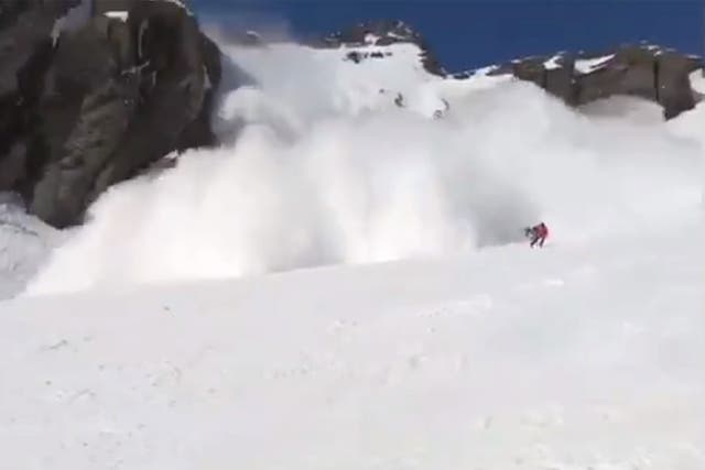 Footage from shows several skiers being caught in a wall of snow as it made its way down the mountain