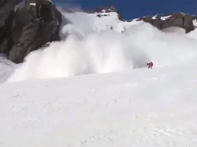 Footage from shows several skiers being caught in a wall of snow as it made its way down the mountain