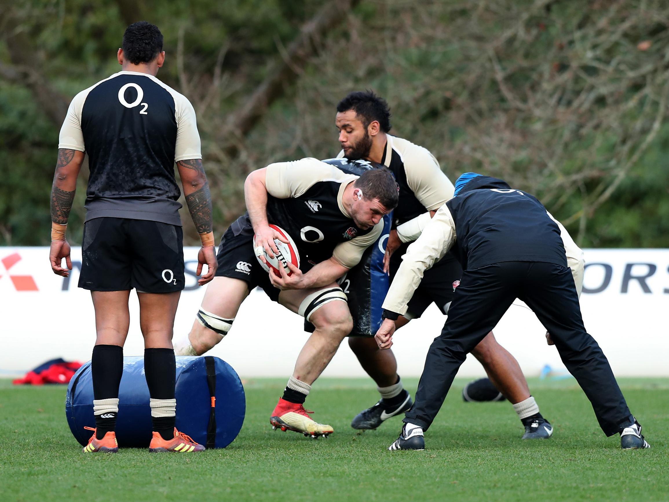 Mark Wilson runs into Billy Vunipola during England training