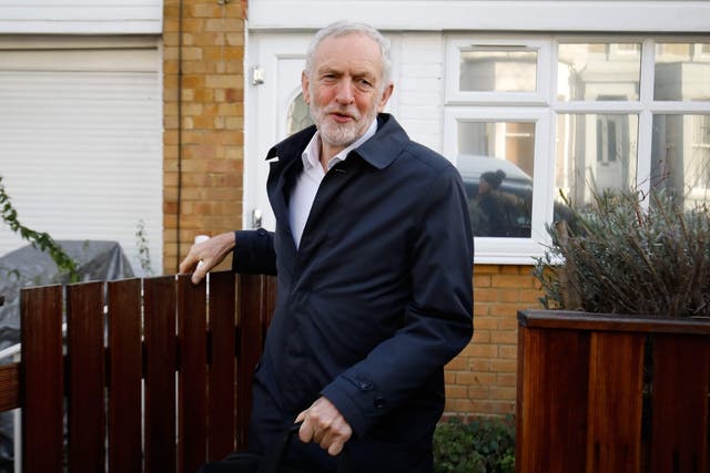 Jeremy Corbyn leaving his house to attend PMQs