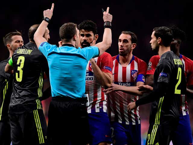 Diego Costa confronts referee Felix Zwayer