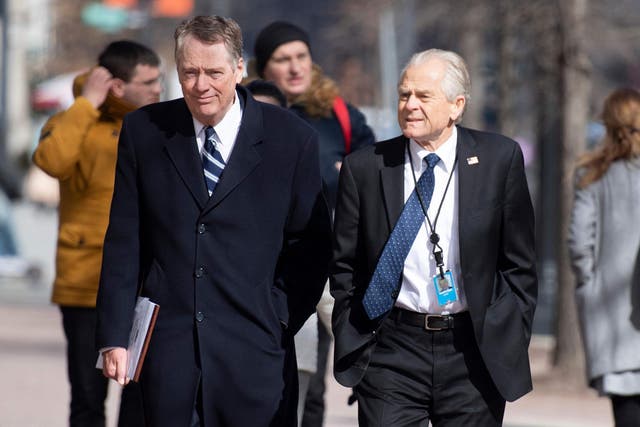 White House trade adviser Peter Navarro (right) walks with US Trade Representative Robert Lighthizer. AFP/Getty