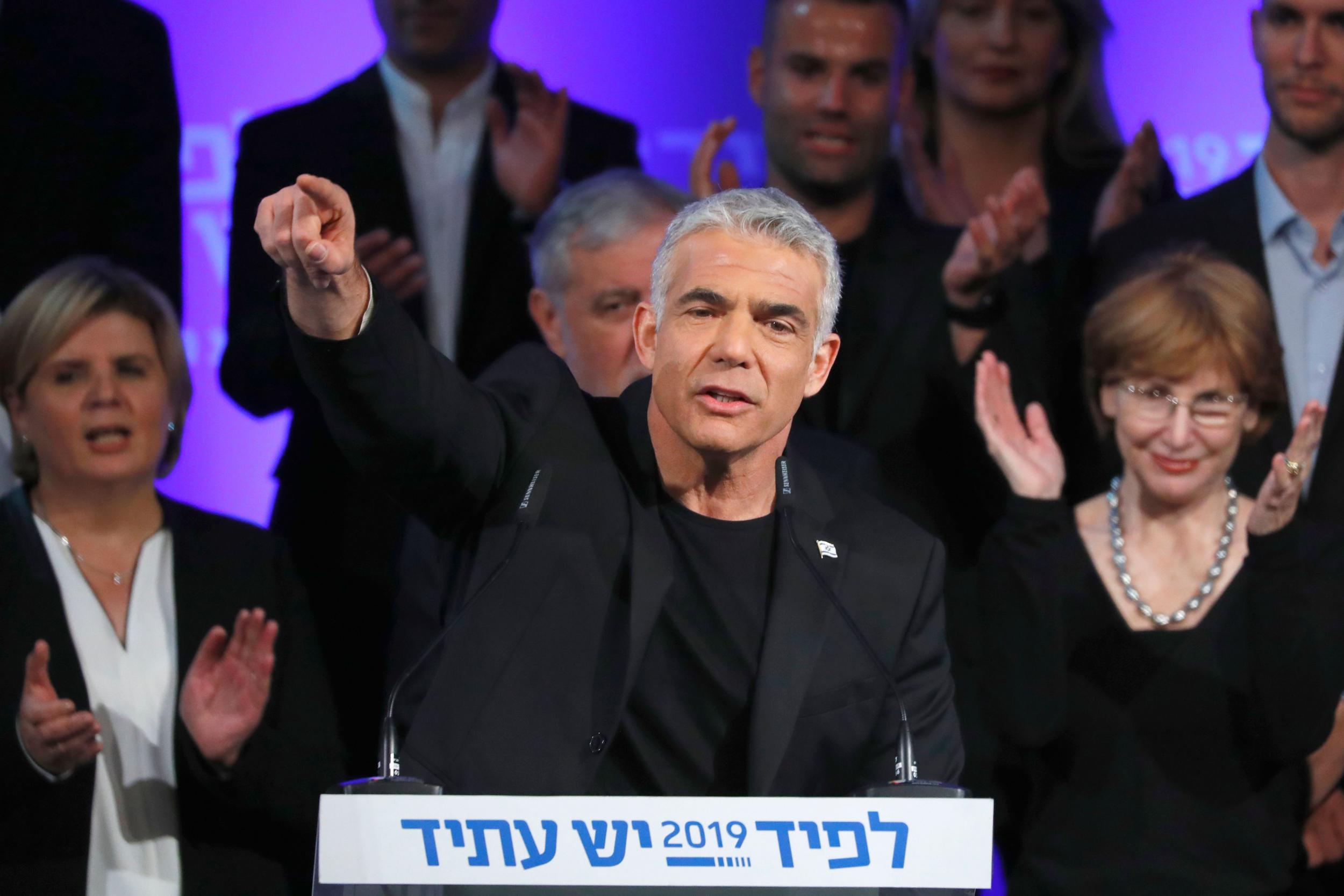 Yair Lapid, chairman of Israel’s Yesh Atid party, presents his electoral list this week (AFP/Getty)