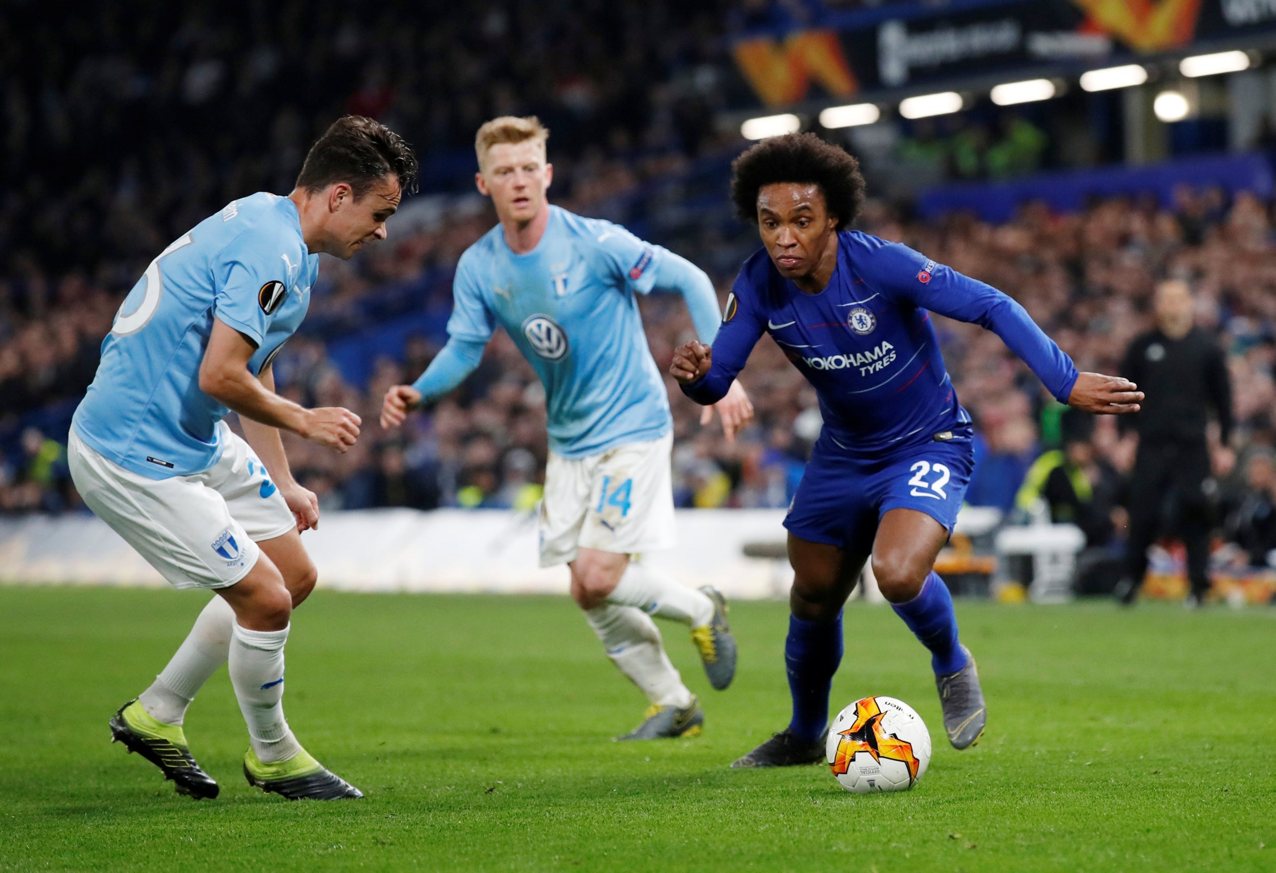 Willian looks to get himself out of a tight situation during the first half
