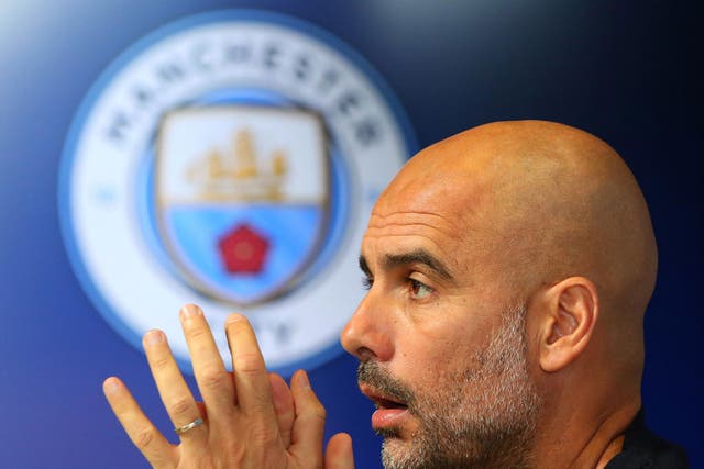Pep Guardiola meets the media at Manchester City's training ground