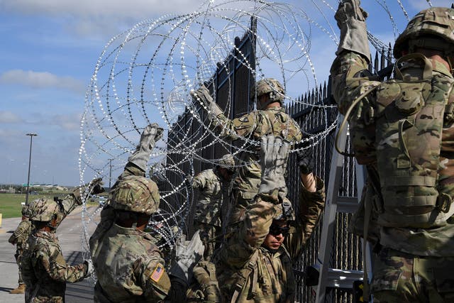 Troops currently stationed at the US-Mexico border have been ordered to string more concertina wire and install detection systems in remote areas, US defence official says
