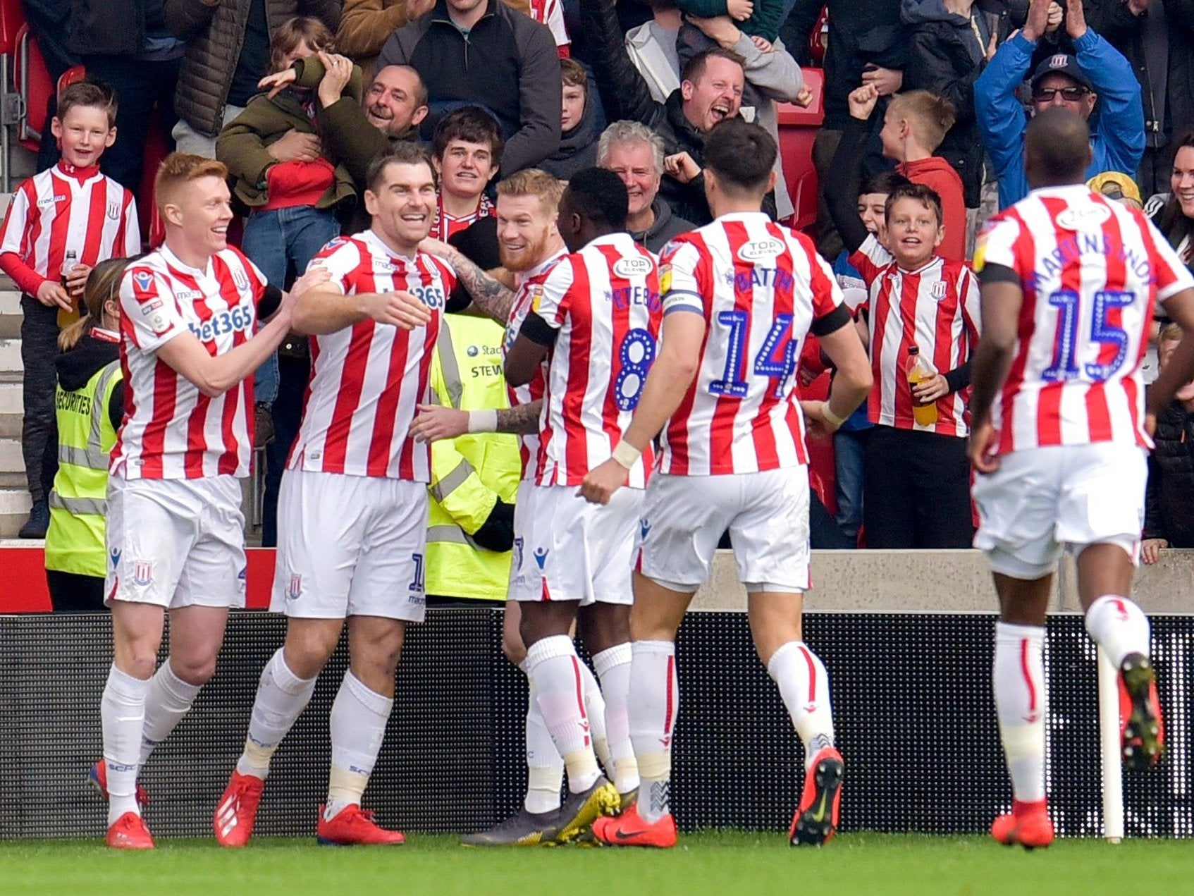 Sam Vokes celebrates with teammates after putting Stoke ahead (Action)